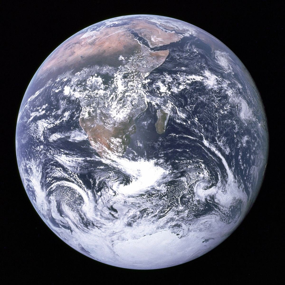 The whole Earth seen from Apollo 17: Africa, Arabia and the Antarctic ice under swirling cloud